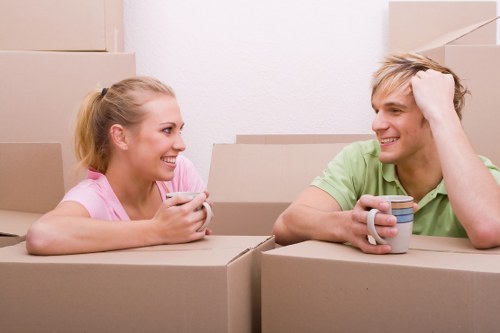 Removal team planning a move in a Chelsea residential street
