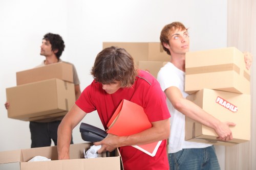 Chelsea house moving team unloading boxes at a new home