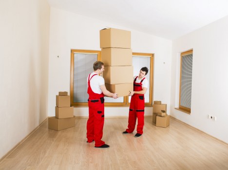 Packed office equipment ready for transport in Chelsea